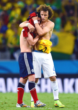 thomasbsangster-blog:  David Luiz of Brazil consoles James Rodriguez of Colombia after Brazil’s 2-1 win during the 2014 FIFA World Cup Brazil Quarter Final match between Brazil and Colombia on July 4, 2014  