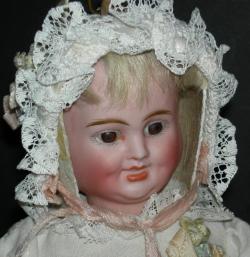 antique three faced doll