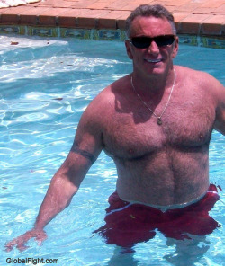 daddysbottom:  This hot daddy is making me wet, and I’m not even in the pool. I’m imagining rubbing my hands all over that wide, hairy chest, pinching his nipples just hard enough to get a reaction out of him. And those broad, strong shoulders. That