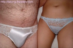 Husband&rsquo;s little penis is easily hidden in a pair of white lace panties.