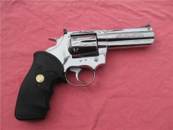 gunrunnerhell:  Colt King Cobra Chambered in .357 Magnum, the King Cobra was part of a series of revolvers named after snakes. Polished stainless steel finishes can add value but proper care is required since wear and scratches become even more evident.