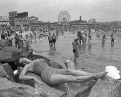 theniftyfifties:  On the beach at Coney Island, 1954 