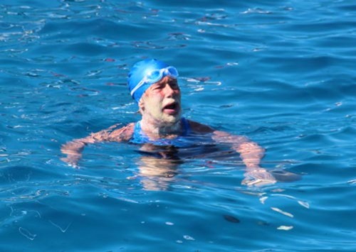 Diana Nyad, pictured just miles from finishing her 100+ mile swim from Cuba to Florida.
