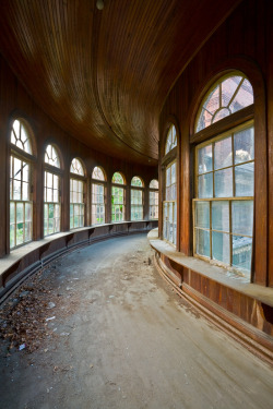 ianference:  It really tears at my heart when they bulldoze one of my lovely asylums for no particular reason.  Pictured here is the wooden skyway that connected the 1854 Kirkbride building at Taunton State Hospital with the later infirmary ward.  It