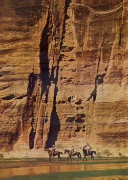vintagenational:  Kodachrome by Justin Locke.  From “Amid the Mighty Walls of Zion,” National Geographic, January, 1954.  A Canyon Wall as Sheer as Masonry Overhangs Hop Creek Valley  Inch by inch, flood waters have dug a mighty ditch deep into the