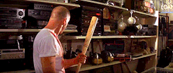 videov0mit:  In this scene he picks up a hammer a bat a chainsaw then the sword All of quentin tarantino’s films tie in to each other because they all take place in his own hyper violent world  It’s weird because every one of the things he picks up