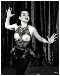 burleskateer:  Rose La Rose     (aka. Rosina DaPello)  A natural exhibitionist,– Rose was notorious for “flashing” the audience during her performances.. It’s safe to assume that she  made good use of this satiny red costume, which featured