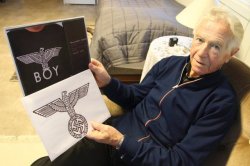 croowley: That man you see there, he is a 92 year old veteran from Norway, who was tortured by the nazis during world war II. The upper picture is the picture of the “BOY London” logo, that’s so popular now days.Then, on the picture under, is a