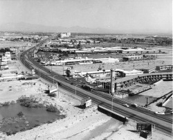 vintagelasvegas:  Las Vegas strip in 1958, north of Flamingo, looking further north towards Sands. Some dusty motels - Sage &amp; Sand, Flamingo Capri, Pyramids Motel, Tumbleweed Motel.  Caesars Palace shops, O’Sheas, Quad and Harras exist here in