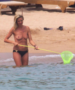 toplessbeachcelebs:  Heidi Klum (Model) swimming topless in Sardinia (August 2011) - Part II