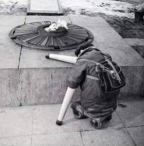 Photo of a Soviet war veteran near the Eternal Flame on the anniversary of Victory Day. 1966 Nudes &amp; Noises  