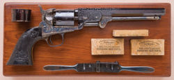 peashooter85:  One of a kind factory engraved Colt Model 1851 Navy revolver with relief carved and checkered ebony grip.  Known as “The Black Beauty.” Sold at Auction: 跢,000