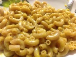 princess-passion-flower:  angrychickpea:  Vegan mac! For the “cheese” sauce, I used GoVeggie Mexican Style Shreds, Earth Balance, Braggs Nutritional Yeast, a little garlic and onion powder, and a dash of turmeric.  (Pro-tip for vegans: I find that,