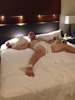 sillylittlemuffin:  This one time, a pretty lady tied me to the bed of our 42nd floor hotel room overlooking the city. She pumped my ass full of suppositories, diapered me, and left me alone to sort out my situation while she got off in the other room