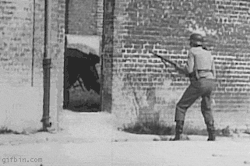 nightbringer24:  egraywwii:  A British soldier holds off a Heer soldier with a brick. Straight from a combat video.   It’s back! 