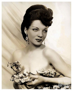   Trudine      aka. “The Quiver Queen”.. An early promotional portrait photo..  