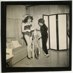 Rusty Lane (”The Duchess of Dis-Robe”) gets fitted for a new dance costume created by: Gussie Gross, a Los Angeles -based clothing designer specializing in Burlesque gowns..