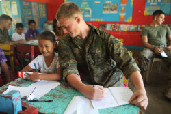 alaskha:  popmist:  rekhless:  panier:  misschloejane:  attackoftheswag:  Marine pretending to cheat off a 4th graders math exam. - Phillippines  This is kind of adorable.  this deserves every single note and then more.  holy moly this is the cutest thing