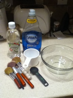 mkay-mariah:  I washed my make-up brushes today after not washing them for almost a year. 1st picture is of all my ingredients and brushes. the next two are the before and after. I saw this recipe on Pinterest and decided to give it a shot before i bought