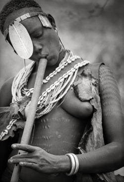 pachatata:  Hamar flute player, Turmi, Ethiopia. 1968. Clark &amp; Joan Worswick 