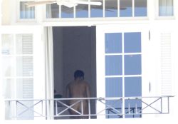 toplessbeachcelebs:  Rihanna (Singer) caught nude while changing in Barbados (December 2012)