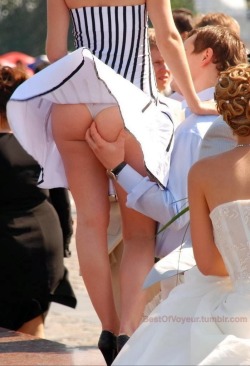 bestofvoyeur:  voyeur: Windy upskirt allow for ass grabbing at a wedding!