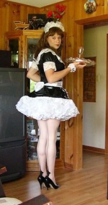 degradedsissy1:  Your wife’s pashing on, on the sofa, with another man - a real man and you’re mincing about in a frilly maids uniform, makeup, and high heels and seamed stockings serving them both drinks. A real man probably wouldn’t allow his