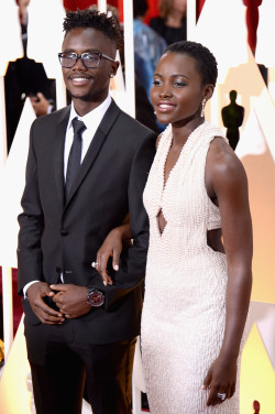 fckyeahprettyafricans:  Kenyacelebritiesofcolor:Peter Nyong’o and actress Lupita Nyong’o attend the 87th Annual Academy Awards at Hollywood &amp; Highland Center on February 22, 2015 in Hollywood, California