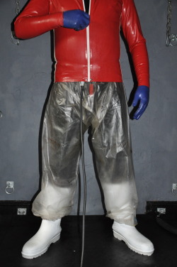 stinkygumboots:  batskin:  Red, blue, black rubber, wellies, plastic and tube joined to a cath  HOT !