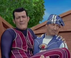 penguinqueen423:  Just look at Sportacus’ face as he holds a very tired, whiny Robbie.  It’s too precious. It’s okay, Robbie.  Sportacus understands. 