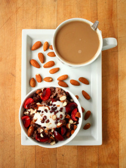garden-of-vegan:  Chocolate-cherry-almond oatmeal (oatmeal: &frac12; cup oats, 1 cup water, unsweetened soy milk, frozen cherries, cacao nibs, and brown sugar. toppings: unsweetened coconut yogurt, cacao nibs, chopped almonds, and fresh cherries.) Coffee