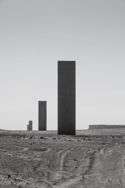 preciousandfregilethings:  onsomething: Richard Serra | “East-West/West-East”, 2014 Doha. Four steel plates that are about 15m (49 feet). Span 1km. “The placement (of the pieces) is not geometrical, it’s topological; they can only be placed where