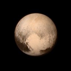 pixelcurious:  mxcleod:  This  stunning image of the Pluto was captured from New Horizons at  about 4 p.m. EDT on July 13, about 16 hours before the moment of closest  approach. The spacecraft was 476,000 miles (766,000 kilometers) from  the surface after