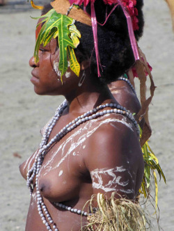 Topless Papuan girl at the Lake Sentani Festival in Indonesia.