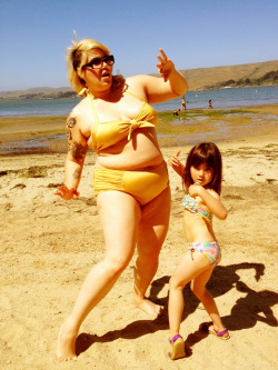 femmesandfamily:  beckpoppins:  dirtynerdycurvy:  My daughter and I had a beach party. I played records and we did the twist in our bikinis.  Bellies are awesome!  awwwwwww  I want to be this kind of mom 