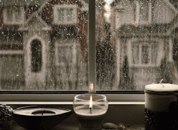   I’m in love with this gif. Everything about it. The rain drizzling. The candle flickering. The colors. I love it.  god this is so relaxing 