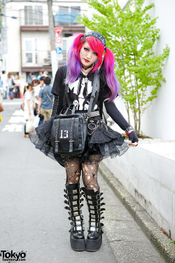 tokyo-fashion:  Moth in Lilac guitarist Lisa13 on the street in Harajuku with pink-purple twintails, a Motionless in White t-shirt, tulle skirt, ripped fishnets, and Demonia buckle boots. Check out our new short YouTube documentary on Lisa! Also see her