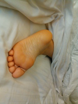 toered:Sexy feet  Do whatever you want to her foot. Just don&rsquo;t wake her up