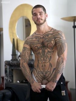 fleshbank:  Here’s a jag for ya: Savagely inked versatile sleazy fukka Logan McCree. When the tattoos flow onto his scalp and cock, you think “whoa, extreme dude!”. But this alternative punk otter is hot whether slamming some stud or takin’ it
