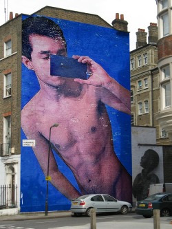 parvo:  Street art in LondonYoung Man Taking Nudes in the Ocean, Artist unknown