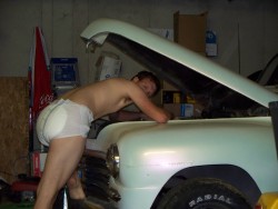 diaperedrock:Why not work on a car and wear a diaper at the same time.  VERY sexy diapered mechanic