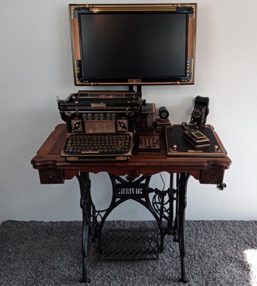 customretrodesign:Custom built and full working classic computer setupFully functioning webcam speakers and Morse code styled mouse. Nixie clock within the typewriter