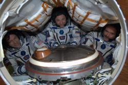 scienceetfiction:  kheldarofdrasnia:  ISS astronauts packed tightly into the Soyuz capsule on their way back to Earth!  Landing at 10:30 (Eastern time) tonight.  The live stream will be here.  And you can read the twitter of Chris Hadfield (no internet