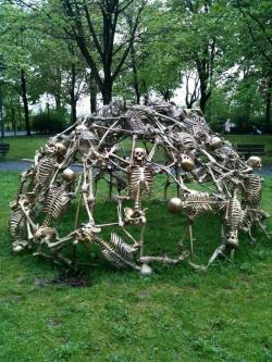 lord-kitschener:  thegoblinmarketofficial:  Skeletal Jungle Gym in the backyard of the church Heilig-Kreuz Kirche in Munich, Germany.Art by Peter Riss   #of course that shit’s german
