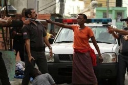  Haitian woman defending her son in the Dominican Republic. 