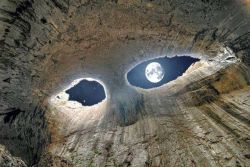 meditationtemptation:“The Eyes of God” -Prohodna Cave, Bulgaria (Source, I believe)This is the full moon from inside a cave. It looks like two eyes staring down at you; beautiful.