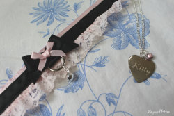 waywardkittenshop:  An adorable order that I sent out the other day :3 super cute! A custom un-ruffled collar with lace and necklace/day collar with ‘Kitty’ inscribed with a small pastel pink/purple bell! 