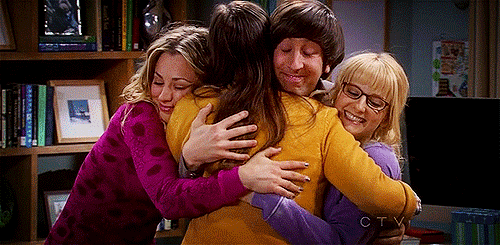 Workplace Friends Doing A Group Hug