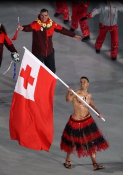 dodgee:  Shirtless Pita Taufafotua, representing the Pacific island nation of Tonga lead his team of representatives into the Olympic Stadium in Pyeongchang, South Korea. With the winter temperature near 20F it is amazing he didn’t freeze. Mr. Taufafotua