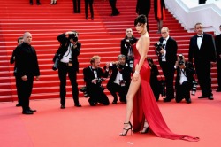 secretbeautysociety:  Bella Hadid at ‘The Unknown Girl’ premiere on May 18, 2016 during the 69th Cannes Film Festival, France.    You can’t lose in red. Bella Hadid killed the red carpet in a stunning, sexy, show-stopping Alexandre Vauthier dress
